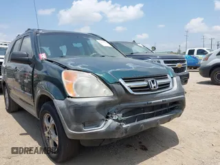 2002 Honda CR-V LX z VIN JHLRD68402C010389, wystawiony jako IAAI lot #42425846 z przebiegiem 129 308 mil mil oraz . Historia ofert i sprzedaży dostępna na DreamBid. Obrazek 6.