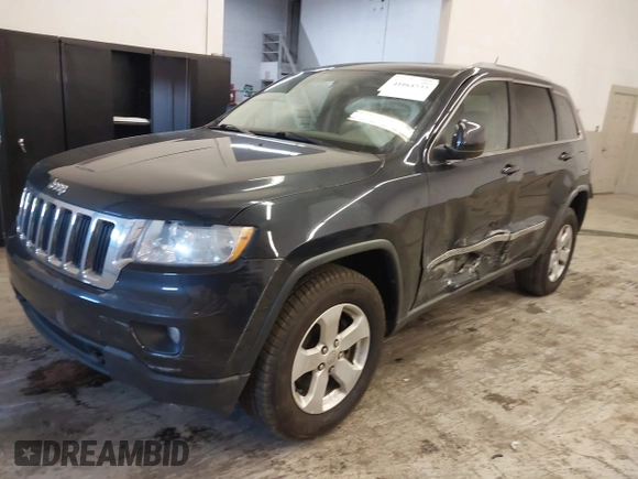 2012 Jeep Grand Cherokee Laredo with VIN 1C4RJFAG5CC351539, listed as a IAAI auction lot 41861533 with 166,909 mi miles. Bid and sale history available at carsss.com. Image 18.