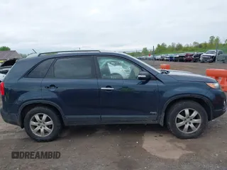 2013 Kia Sorento LX with VIN 5XYKTCA67DG405003, listed as a IAAI auction lot 42253887 with 197,093 mi miles and . Bid and sale history available at DreamBid. Image 14.