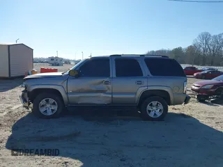 2003 Chevrolet Tahoe LS with VIN 1GNEK13Z03J294201, listed as a IAAI auction lot 41656836 with 302,922 mi miles. Bid and sale history available at carsss.com. Image 14.