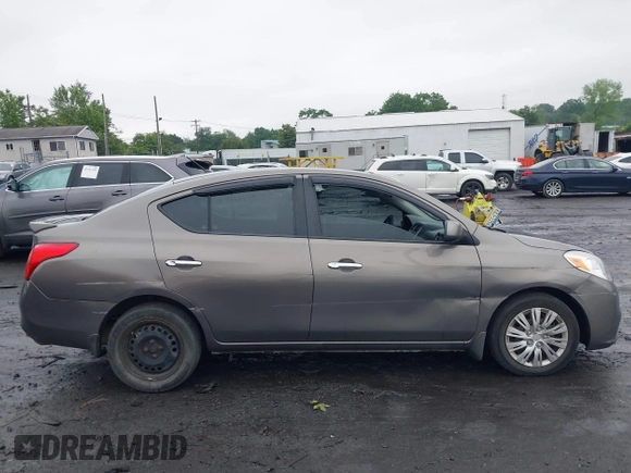 2013 Nissan Versa S with VIN 3N1CN7AP9DL861143, listed as a IAAI auction lot 42538137 with 249,439 mi miles and . Bid and sale history available at DreamBid. Image 13.
