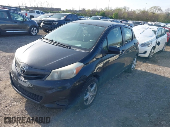 2013 Toyota Yaris L with VIN JTDKTUD35DD548148, listed as a IAAI auction lot 41939847 with 336,231 mi miles. Bid and sale history available at carsss.com. Image 2.