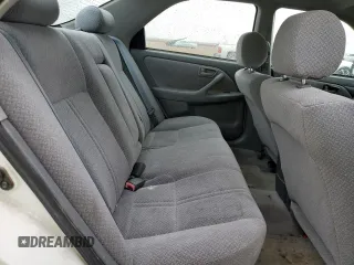 2000 Toyota Camry LE z VIN 4T1BF22KXYU953641, wystawiony jako Copart lot #48018145 z przebiegiem 118 587 mil mil oraz Czysty tytuł • Clean title. Historia ofert i sprzedaży dostępna na DreamBid. Obrazek 10.