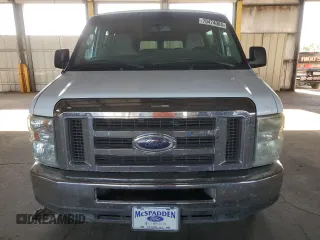 2013 Ford Econoline Passenger XL with VIN 1FBSS3BL0DDA77076, listed as a Copart auction lot 70474004 with 154,679 mi miles and Salvage Title. Bid and sale history available at carsss.com. Image 5.