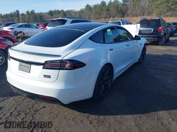 2023 Tesla Model S Plaid with VIN 5YJSA1E64PF512509, listed as a IAAI auction lot 41086678 with Not provided miles and . Bid and sale history available at DreamBid. Image 4.