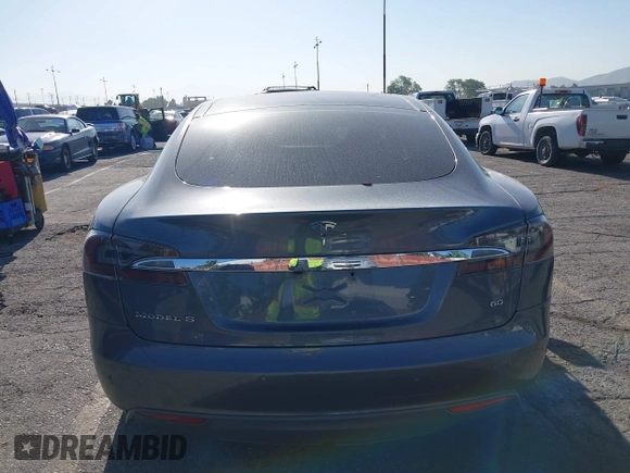 2014 Tesla Model S 60 with VIN 5YJSA1S11EFP35998, listed as a IAAI auction lot 42316563 with 83,835 mi miles and . Bid and sale history available at DreamBid. Image 17.