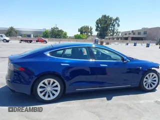 2018 Tesla Model S 75D with VIN 5YJSA1E22JF262269, listed as a IAAI auction lot 42629704 with 131,138 mi miles and . Bid and sale history available at DreamBid. Image 14.