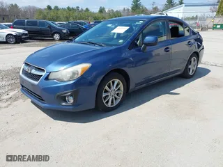 2012 Subaru Impreza Sedan 2.0i Premium with VIN JF1GJAC63CH020482, listed as a IAAI auction lot 42051003 with 169,070 mi miles. Bid and sale history available at carsss.com. Image 2.