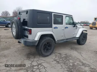 2008 Jeep Wrangler Unlimited Sahara с VIN 1J4GA59138L505460, выставлен на аукционе IAAI как лот 41846611 с пробегом 116 658 миль миль и . История ставок и продаж доступна на DreamBid. Изображение 4.