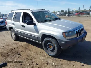 2003 Jeep Grand Cherokee Laredo with VIN 1J4GX48S03C577759, listed as a IAAI auction lot 41969103 with 91,305 mi miles. Bid and sale history available at carsss.com. Image 1.