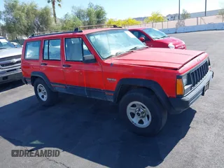 1996 Jeep Cherokee Sport with VIN 1J4FT68S0TL225719, listed as a IAAI auction lot 42121351 with 237,602 mi miles and . Bid and sale history available at DreamBid. Image 1.