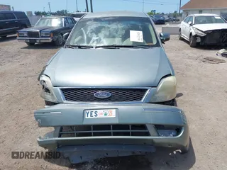 2005 Ford Five Hundred SEL z VIN 1FAFP241X5G118341, wystawiony jako IAAI lot #42012730 z przebiegiem Nie podano mil oraz . Historia ofert i sprzedaży dostępna na DreamBid. Obrazek 6.