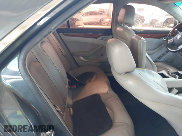 2011 Cadillac CTS Luxury with VIN 1G6DF5EY6B0104932, listed as a IAAI auction lot 42032457 with 165,833 mi miles and . Bid and sale history available at DreamBid. Image 8.