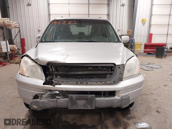 2005 Honda Pilot EX-L with VIN 2HKYF18575H557005, listed as a IAAI auction lot 41647830 with 245,992 mi miles. Bid and sale history available at carsss.com. Image 12.
