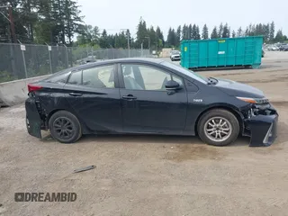 2021 Toyota Prius LE z VIN JTDKAMFP0M3179016, wystawiony jako IAAI lot #42204095 z przebiegiem 34 691 mil mil oraz . Historia ofert i sprzedaży dostępna na DreamBid. Obrazek 14.