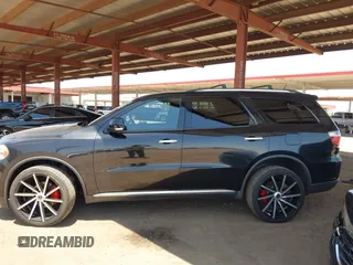2013 Dodge Durango Crew with VIN 1C4RDHDG1DC508676, listed as a IAAI auction lot 42520380 with 126,250 mi miles and . Bid and sale history available at DreamBid. Image 14.