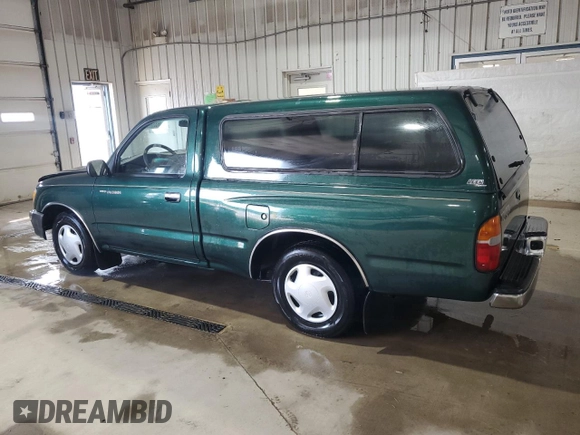 1999 Toyota Tacoma with VIN 4TANL42N4XZ453505, listed as a Copart auction lot 63399325 with 175,198 mi miles and Salvage title. Bid and sale history available at DreamBid. Image 2.