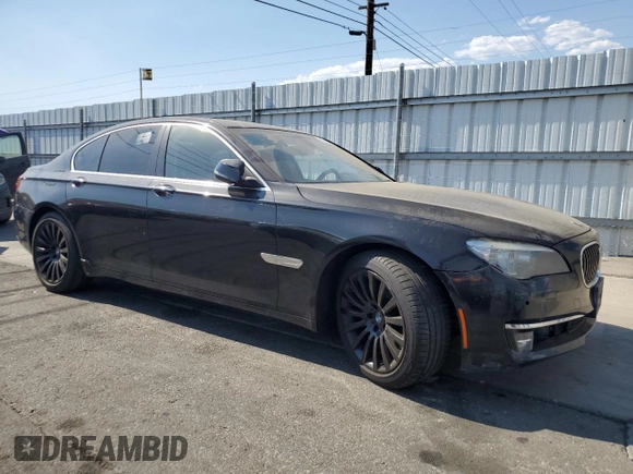 2013 BMW 7 Series 740i with VIN WBAYA6C52DC995036, listed as a Copart auction lot 70317414 with 126,246 mi miles and Clean Title. Bid and sale history available at carsss.com. Image 4.