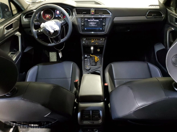 2021 Volkswagen Tiguan SE with VIN 3VV2B7AXXMM071024, listed as a Copart auction lot 52243675 with 31,448 mi miles and Salvage Title. Bid and sale history available at DreamBid. Image 8.