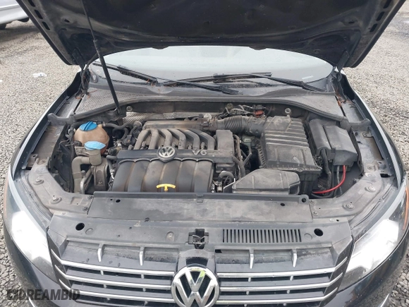 2013 Volkswagen Passat SEL Premium with VIN 1VWCM7A3XDC132834, listed as a IAAI auction lot 40931506 with 146,283 mi miles. Bid and sale history available at carsss.com. Image 10.