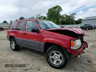 1997 Jeep Grand Cherokee Laredo with VIN 1J4GZ58S3VC739922, listed as a Copart auction lot 55667885 with 209,075 mi miles and Salvage title. Bid and sale history available at DreamBid. Image 15.