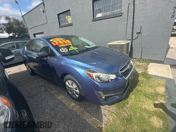 2016 Subaru Impreza z VIN JF1GJAA64GH004932, wystawiony jako Copart lot #87751265 z przebiegiem 99 587 mil mil oraz Czysty tytuł • Clean title. Historia ofert i sprzedaży dostępna na DreamBid. Obrazek 1.