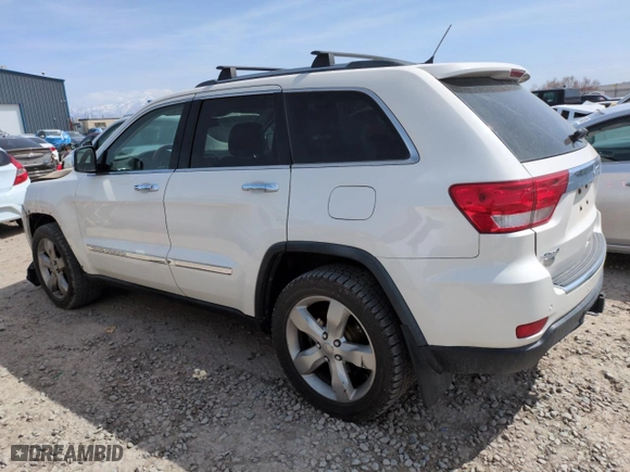 2012 Jeep Grand Cherokee Overland with VIN 1C4RJFCG9CC199486, listed as a Copart auction lot 51942135 with 113,098 mi miles and Salvage Title. Bid and sale history available at carsss.com. Image 2.