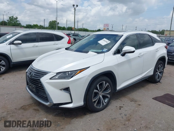 2016 Lexus RX 350 z VIN 2T2ZZMCAXGC001550, wystawiony jako IAAI lot #42083488 z przebiegiem 93 377 mil mil oraz . Historia ofert i sprzedaży dostępna na DreamBid. Obrazek 2.
