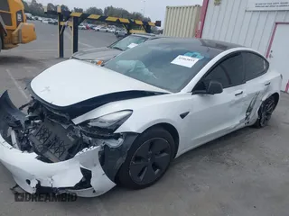2023 Tesla Model 3 with VIN 5YJ3E1EA2PF417959, listed as a IAAI auction lot 42463853 with 22,736 mi miles and . Bid and sale history available at DreamBid. Image 21.