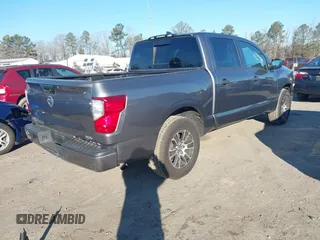 2022 Nissan Titan SV with VIN 1N6AA1EE3NN104176, listed as a IAAI auction lot 41159789 with 53,991 mi miles and . Bid and sale history available at DreamBid. Image 4.