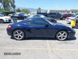 2007 Porsche 718 Cayman z VIN WP0AA29837U762585, wystawiony jako IAAI lot #42201028 z przebiegiem 58 563 mil mil oraz . Historia ofert i sprzedaży dostępna na DreamBid. Obrazek 13.
