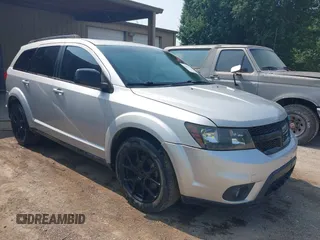2013 Dodge Journey SXT with VIN 3C4PDDBG3DT661924, listed as a IAAI auction lot 42430211 with Not provided miles and . Bid and sale history available at DreamBid. Image 1.