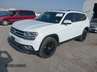 2019 Volkswagen Atlas SEL z VIN 1V2MR2CA8KC569640, wystawiony jako IAAI lot #42083995 z przebiegiem 127 104 mil mil oraz . Historia ofert i sprzedaży dostępna na DreamBid. Obrazek 2.