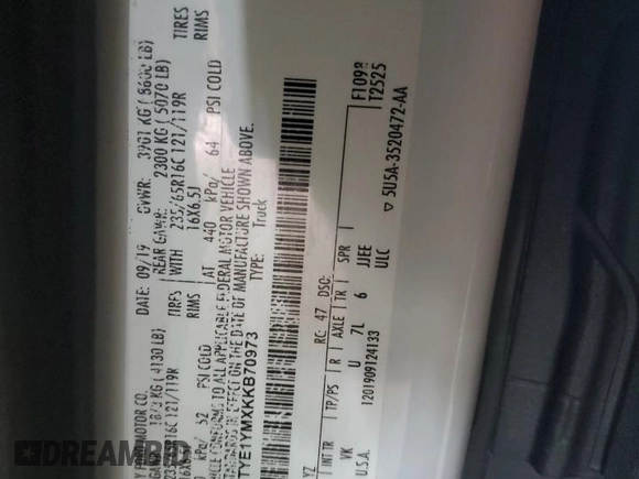 2019 Ford Transit z VIN 1FTYE1YMXKKB70973, wystawiony jako Copart lot #50938595 z przebiegiem 181 879 mil mil oraz Szkoda całkowita • Salvage title. Historia ofert i sprzedaży dostępna na DreamBid. Obrazek 13.