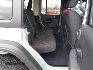 2023 Jeep Wrangler Rubicon with VIN 1C4JJXFG7PW654564, listed as a IAAI auction lot 41833534 with 22,277 mi miles and . Bid and sale history available at DreamBid. Image 8.