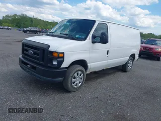 2011 Ford Econoline Cargo Commercial with VIN 1FTNE1EW4BDA34187, listed as a IAAI auction lot 42164691 with 210,699 mi miles. Bid and sale history available at carsss.com. Image 2.