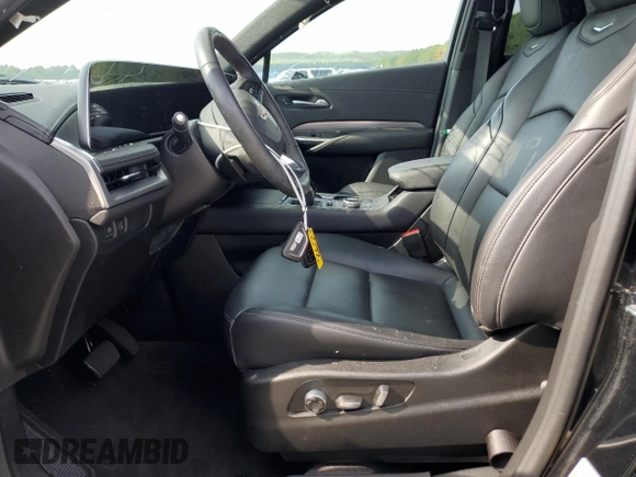 2024 Cadillac XT4 AWD Premium Luxury with VIN 1GYFZDR49RF112460, listed as a Copart auction lot 67183524 with 12,396 mi miles and Salvage title. Bid and sale history available at DreamBid. Image 7.