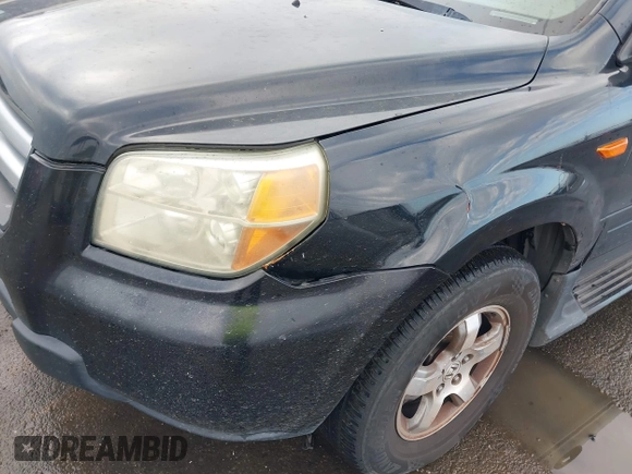 2006 Honda Pilot EX-L with VIN 2HKYF18726H552054, listed as a IAAI auction lot 41822652 with 153,822 mi miles and . Bid and sale history available at DreamBid. Image 6.
