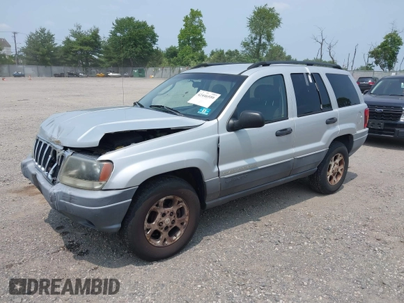 2002 Jeep Grand Cherokee Laredo with VIN 1J4GW48SX2C313093, listed as a IAAI auction lot 42446559 with 200,319 mi miles and . Bid and sale history available at DreamBid. Image 20.