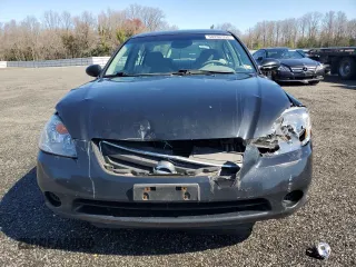 2002 Nissan Altima S with VIN 1N4AL11E12C233050, listed as a Copart auction lot 50200395 with 234,420 mi miles and Salvage Title. Bid and sale history available at carsss.com. Image 5.