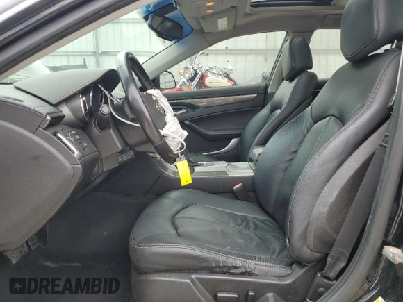2012 Cadillac CTS with VIN 1G6DC5E56C0129152, listed as a Copart auction lot 55173295 with 93,551 mi miles and Salvage title. Bid and sale history available at DreamBid. Image 7.