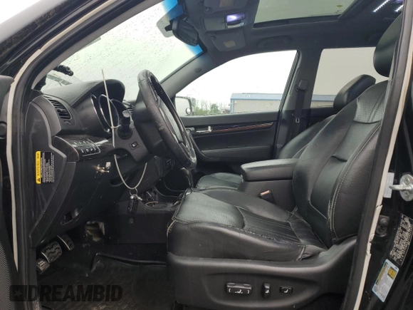 2012 Kia Sorento SX with VIN 5XYKWDA21CG213651, listed as a Copart auction lot 60831745 with 227,817 mi miles and Clean title. Bid and sale history available at DreamBid. Image 7.