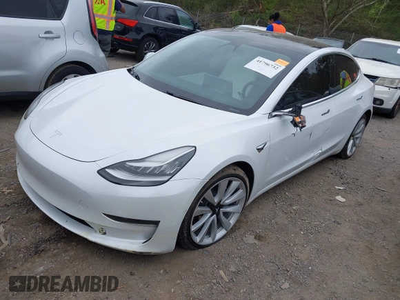2020 Tesla Model 3 Long Range with VIN 5YJ3E1EB0LF703733, listed as a IAAI auction lot 41796732 with 75,027 mi miles. Bid and sale history available at carsss.com. Image 19.