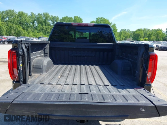 2021 GMC Sierra 1500 Denali with VIN 1GTU9FEL4MZ253708, listed as a IAAI auction lot 42209839 with 52,279 mi miles and . Bid and sale history available at DreamBid. Image 17.