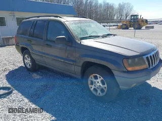 2002 Jeep Grand Cherokee with VIN 1J4GX38S92C149908, listed as a IAAI auction lot 41782530 with 145,195 mi miles and . Bid and sale history available at DreamBid. Image 1.