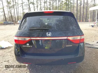 2013 Honda Odyssey Touring with VIN 5FNRL5H96DB003796, listed as a IAAI auction lot 41828376 with 6,308 mi miles and . Bid and sale history available at carsss.com. Image 16.