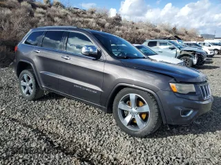 2015 Jeep Grand Cherokee Overland with VIN 1C4RJFCT4FC118184, listed as a Copart auction lot 44465045 with 143,149 mi miles and Salvage Title. Bid and sale history available at carsss.com. Image 4.