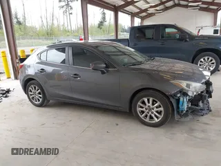 2014 Mazda 3 i Touring z VIN JM1BM1L71E1193465, wystawiony jako IAAI lot #42078287 z przebiegiem 144 014 mil mil oraz . Historia ofert i sprzedaży dostępna na DreamBid. Obrazek 14.