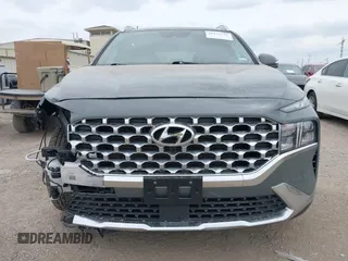 2023 Hyundai Santa Fe SEL z VIN 5NMS34AJ4PH523126, wystawiony jako IAAI lot #42117723 z przebiegiem 61 479 mil mil oraz . Historia ofert i sprzedaży dostępna na DreamBid. Obrazek 12.