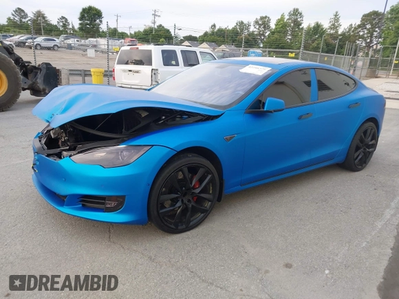 2013 Tesla Model S Performance with VIN 5YJSA1DP5DFP25345, listed as a IAAI auction lot 42288379 with 165,915 mi miles and . Bid and sale history available at DreamBid. Image 2.